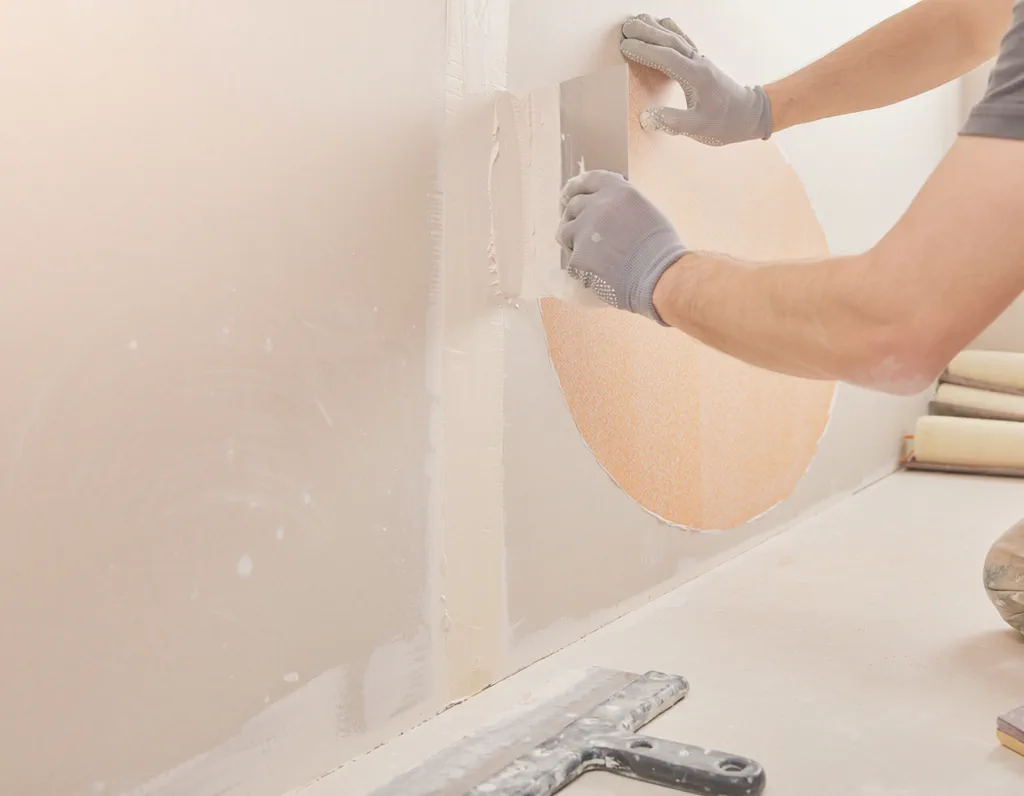 Close-up of drywall texture matching and finishing work